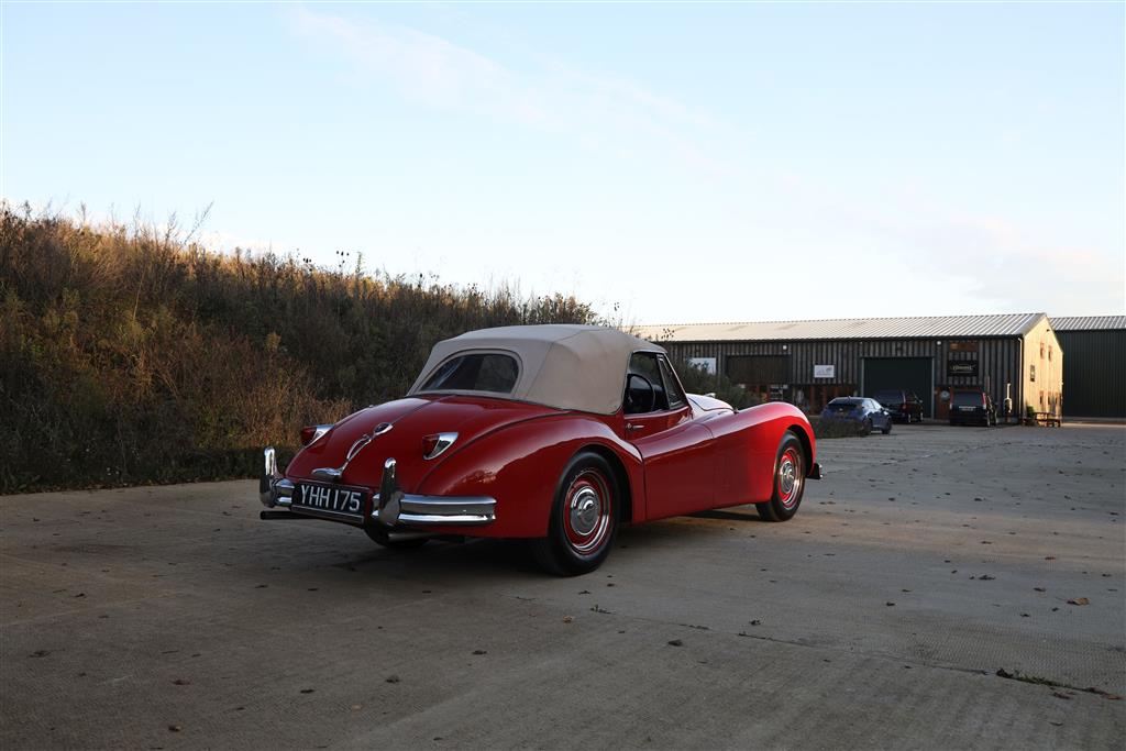 A 1955 Jaguar XK140 DHC